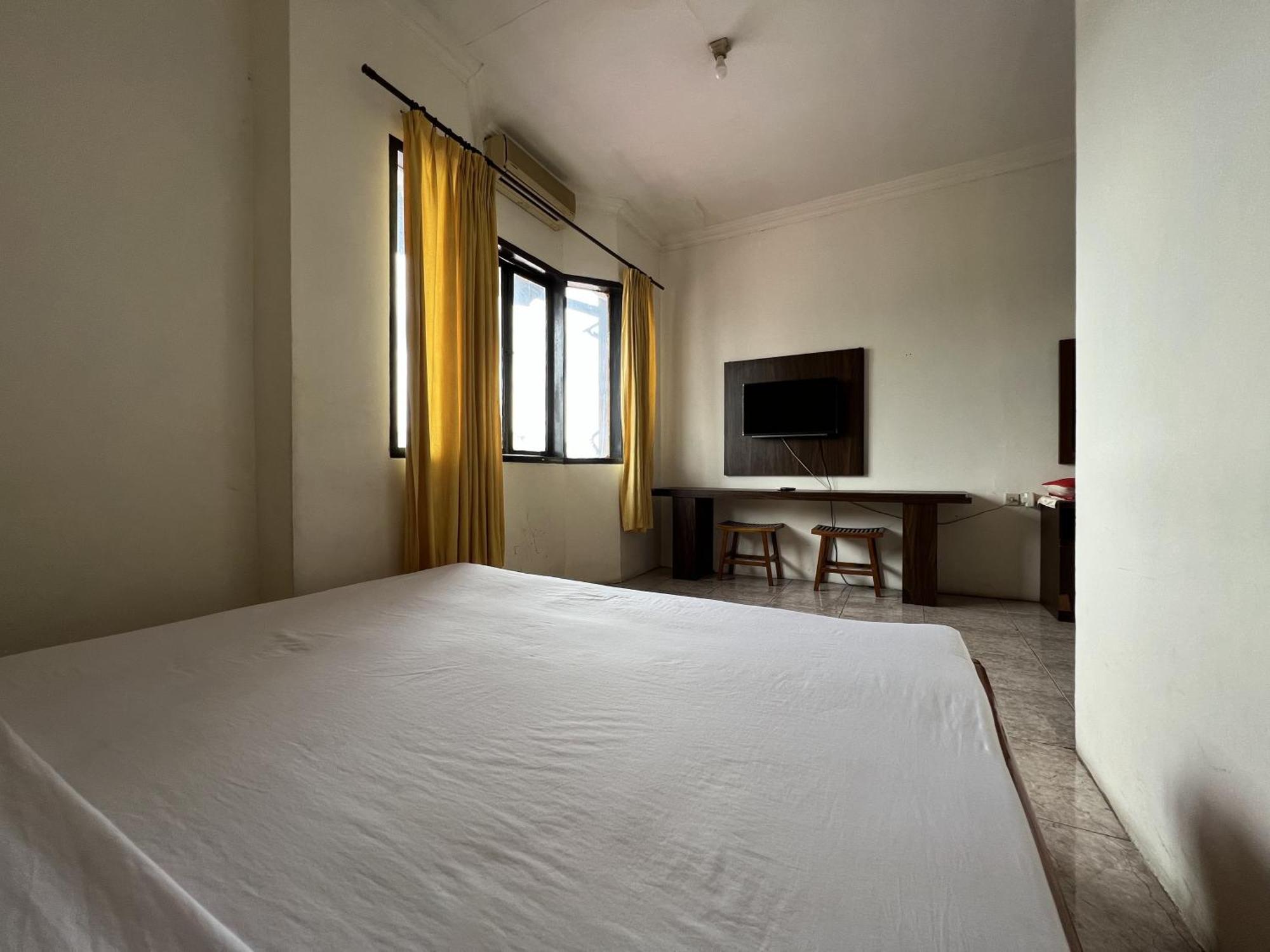 Oyo 92098 Kost Orange Syariah 2*