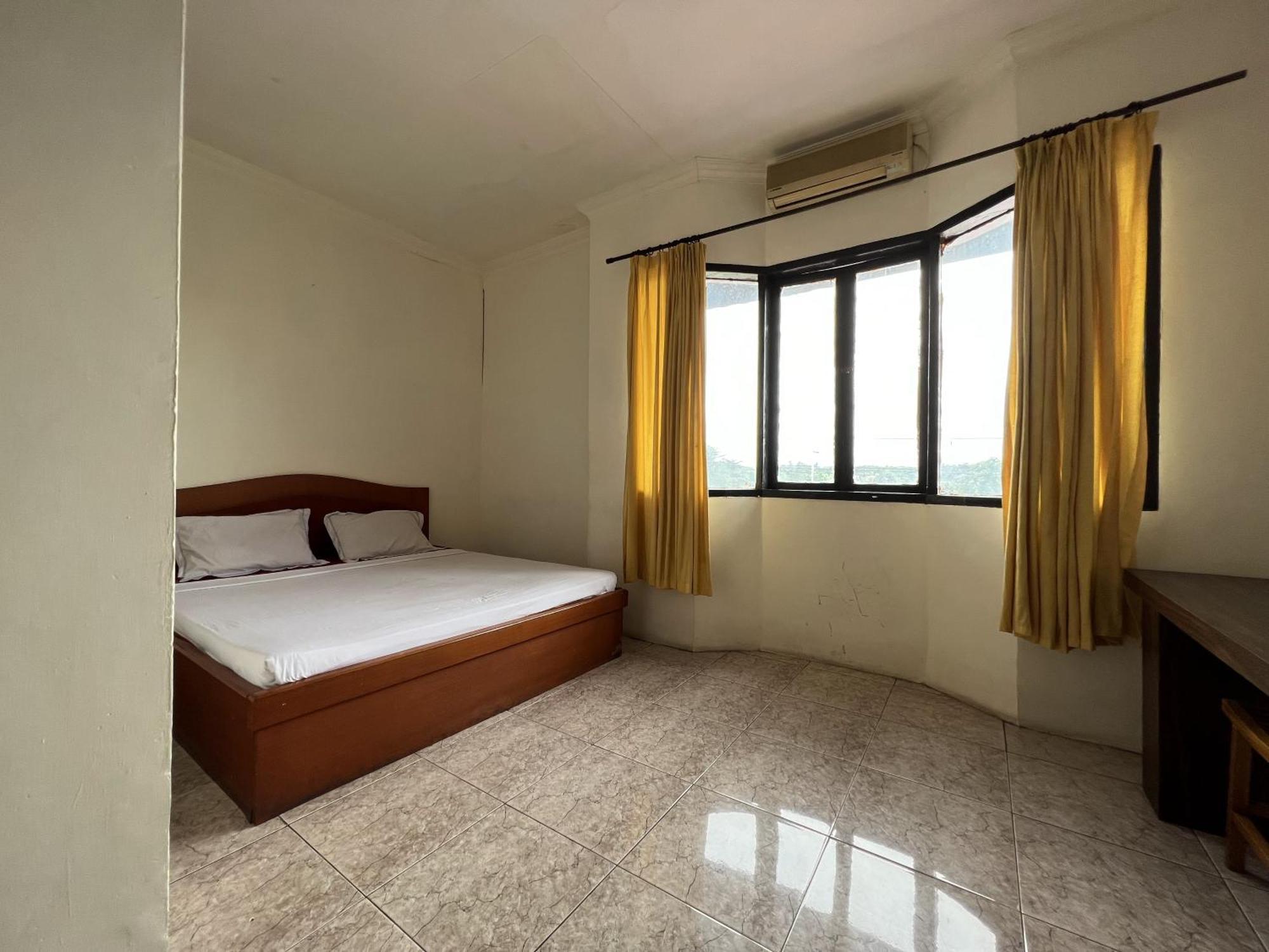 Oyo 92098 Kost Orange Syariah 2*