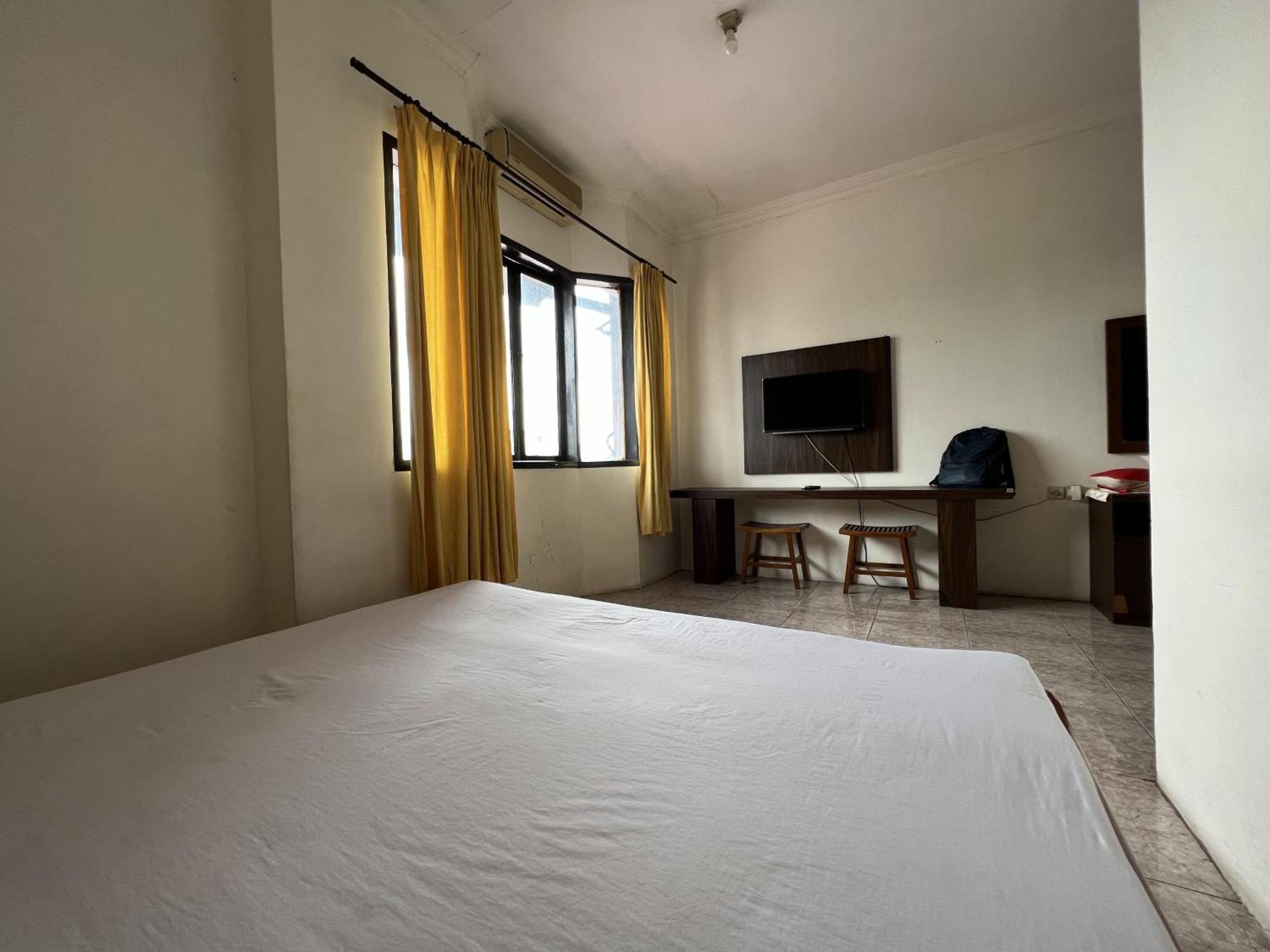Oyo 92098 Kost Orange Syariah Hotel